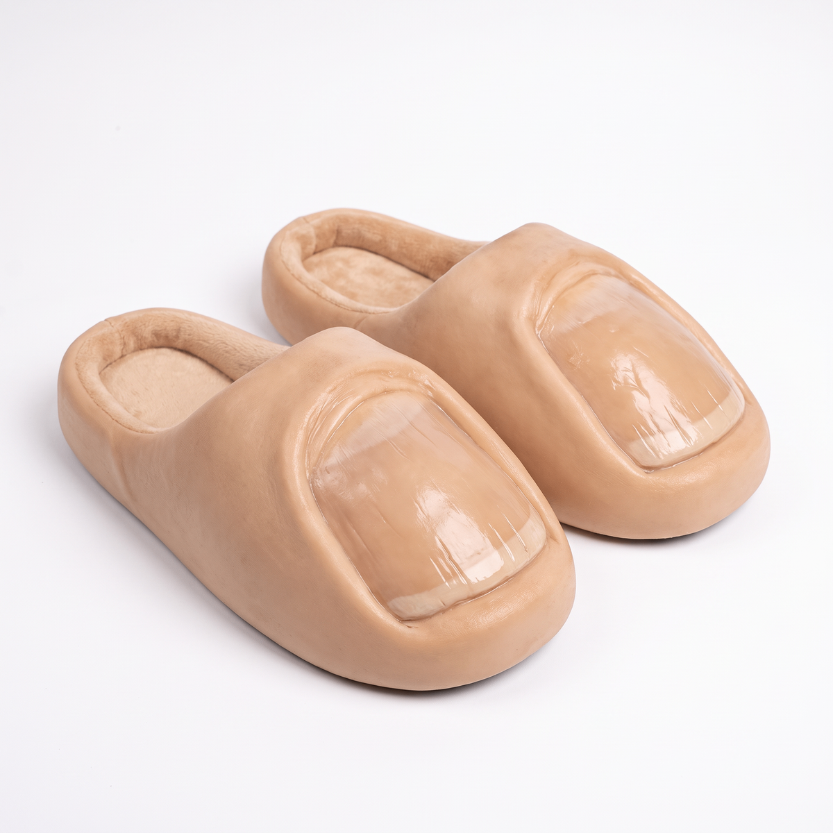FuniFeet giant toenail slippers on white